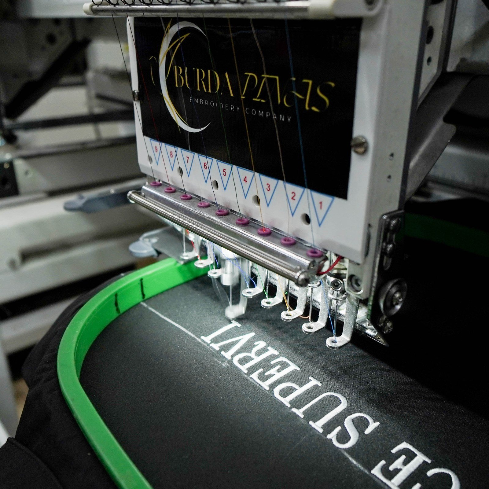 Burda Pinas production floor — embroidery and sewing in progress